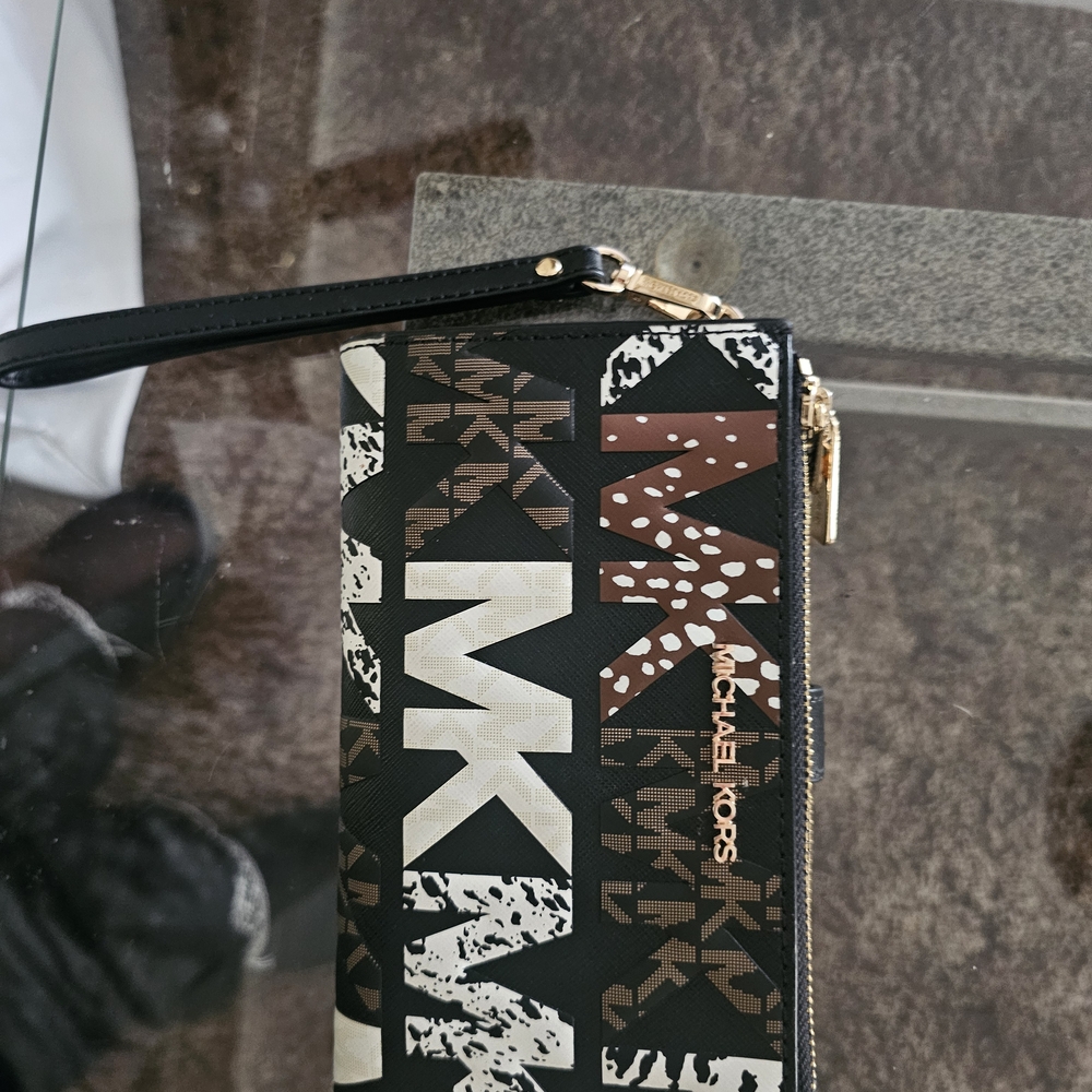*Sold On Merc*. Michael Kors Black and Brown Logo Wallet